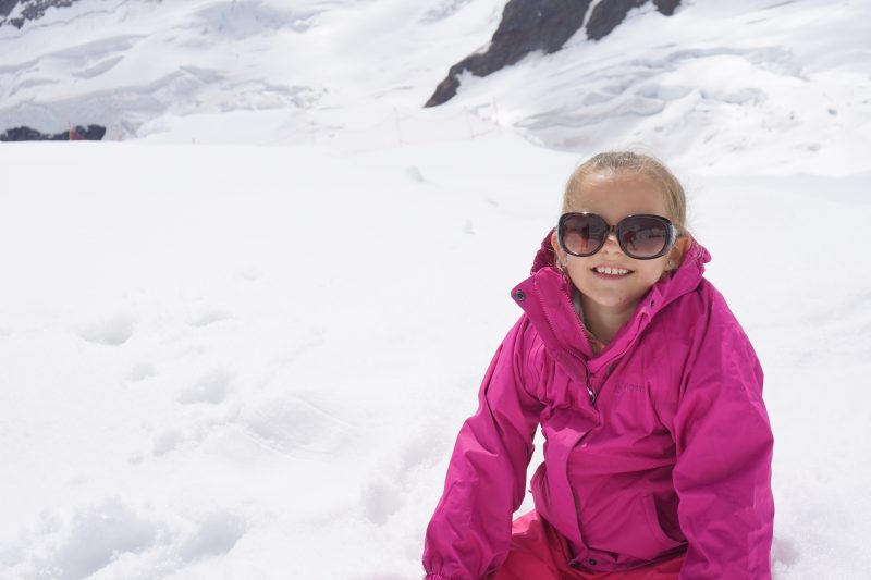 Child in the snow at the Jungfraujoch